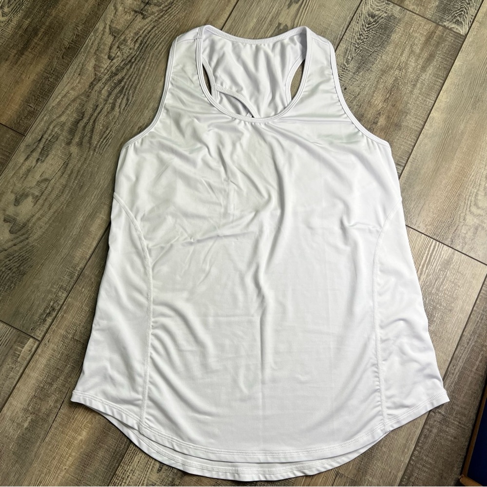 Activewear top. WH. M. Stretchy. Comfortable. Long front. Used 1x.